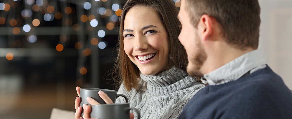 man and woman drinking hot chocolate