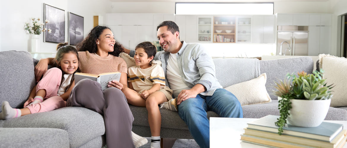 Happy homeowners with condensing furnace unit