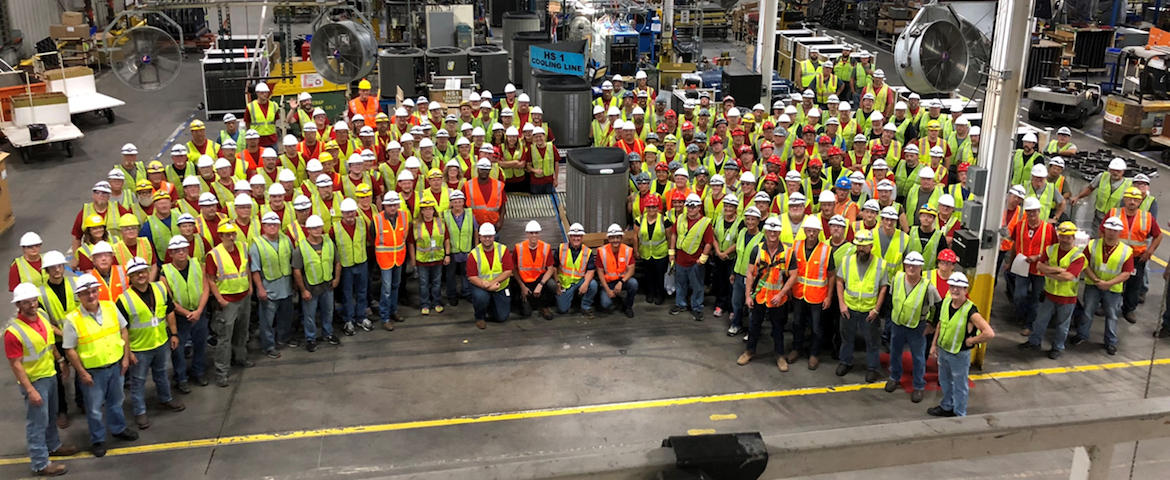 Marshalltown Lennox works gather for a photo in the plant