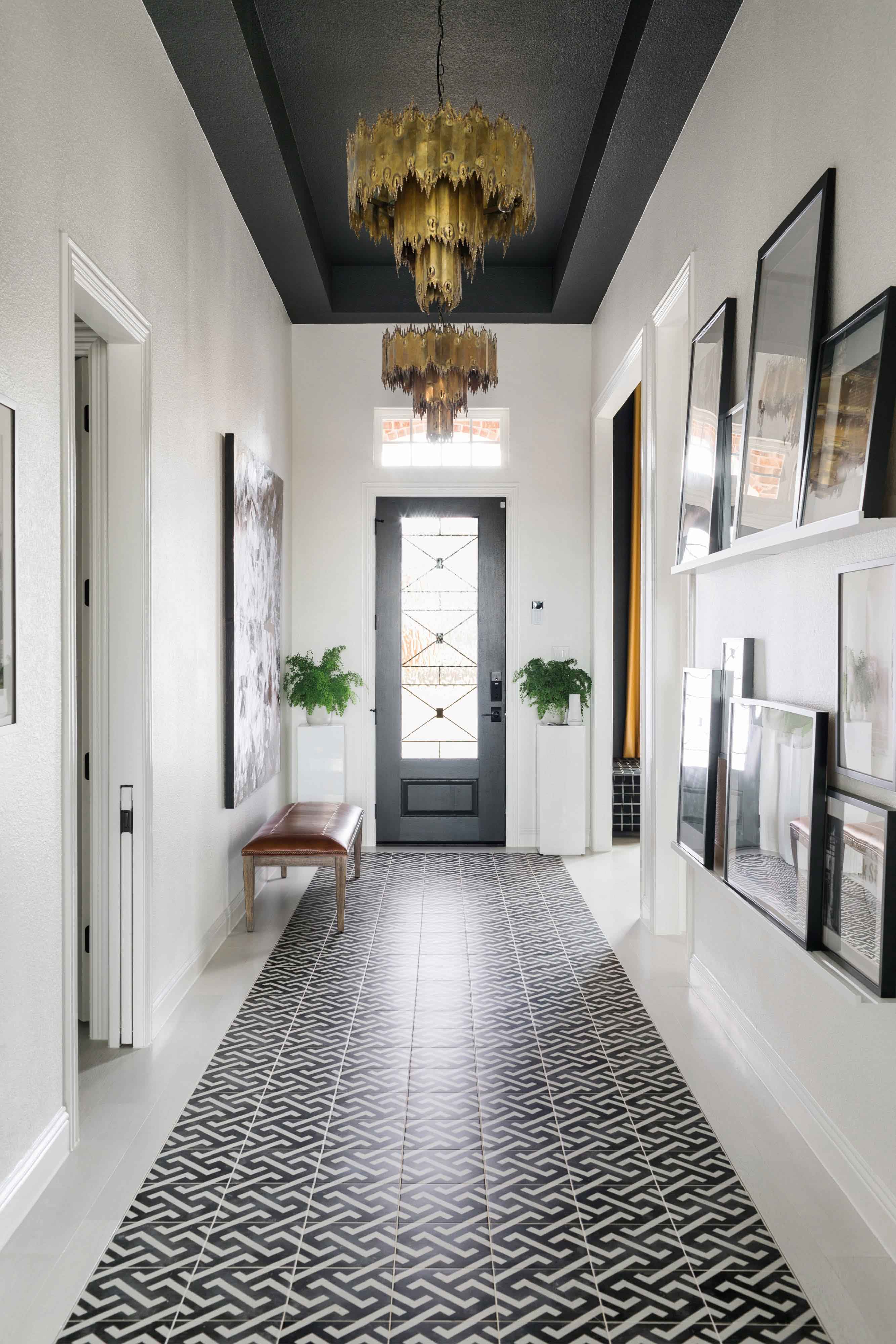 Long White Hallway with Chandelier